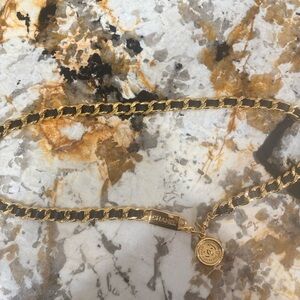 CHANEL Black and Gold Chain Accessory
